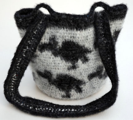 Tapestry crocheted Vulture Purse after felting